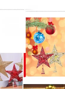 Close-up of glittery red and gold star tree toppers with metal spring bases for Christmas