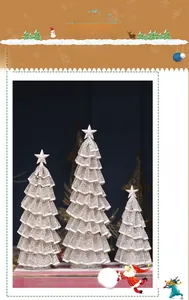 Three champagne gold iron mesh Christmas trees with glittering stars on wooden bases