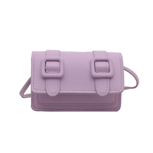 Minimalist lavender PU leather crossbody bag with decorative straps and flap closure