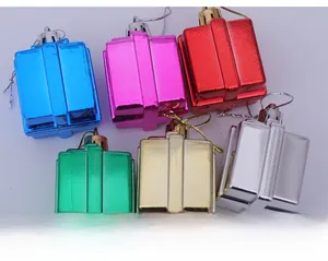 Macro shot of colorful electroplated Christmas tree gift box ornaments in six vibrant colors