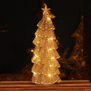 Golden iron mesh Christmas tree lamp with warm LED lights and a star on wooden base