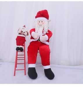 Plush Santa Claus figurines with wooden ladder on white faux snow carpet background