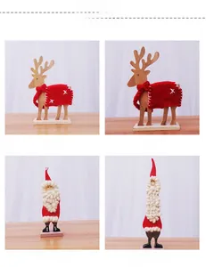 Detalle de figuras navideñas de renos y Papá Noel hechas de madera, fieltro y punto