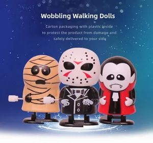 Detail of Halloween wind-up walking dolls featuring mummy and classic horror characters