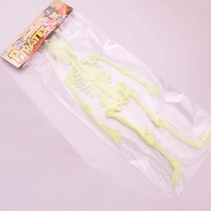 Glow in the dark pirate skeleton toy with detailed fluorescent plastic and head card