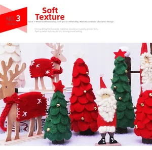 Detalle de reno de madera y árbol de Navidad de fieltro con textura de tela suave