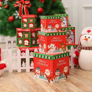 Three-piece stackable Christmas gift boxes with festive illustrations for holiday decor
