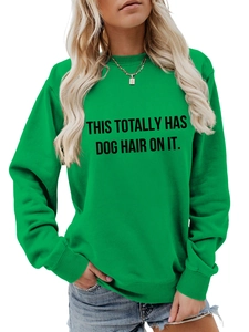 Front view of bright green crewneck sweatshirt with 'THIS TOTALLY HAS DOG HAIR ON IT' text