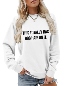 Detail of ribbed neckline and 'THIS TOTALLY HAS DOG HAIR ON IT' print on white sweatshirt