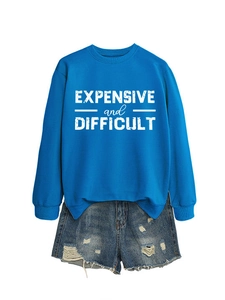 Detail of bright blue crewneck sweatshirt with white EXPENSIVE and DIFFICULT print