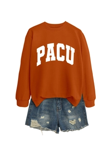 Detail of PACU letter print on caramel long sleeve sweatshirt and distressed denim shorts