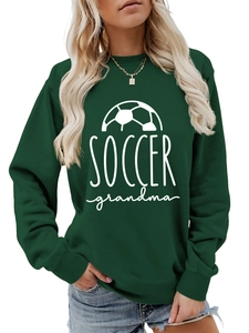 Close-up of the Soccer Grandma graphic and ribbed cuffs on this dark green sweatshirt