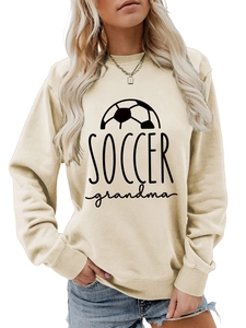 Close-up of Soccer Grandma graphic print on cream crewneck sweatshirt with ribbed collar