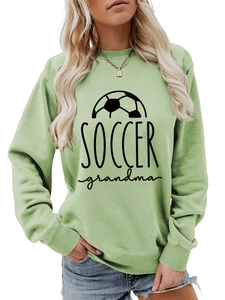Detail of sage green soccer grandma sweatshirt showing ribbed cuffs and premium cotton texture