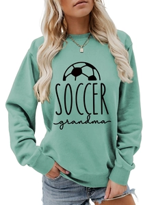 Detail of the Soccer Grandma mint green sweatshirt featuring ribbed cuffs and crew neck