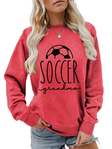 Detail of red long-sleeved Soccer Grandma sweatshirt with ribbed cuffs and football print