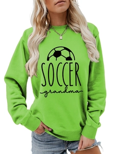 Detail of Soccer Grandma print on a vibrant green crewneck sweatshirt with ribbed cuffs