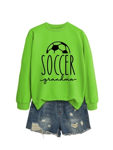 Detail of neon green soccer grandma sweatshirt with ribbed cuffs and graphic print