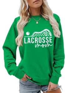 Detail of green Lacrosse Mom sweatshirt showing cotton texture and white graphic print