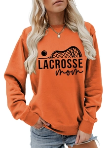 Close-up of Lacrosse Mom print on orange long-sleeve sweatshirt with ribbed cuffs