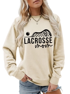 Detail of screen-printed Lacrosse Mom text and racket graphics on beige sweatshirt