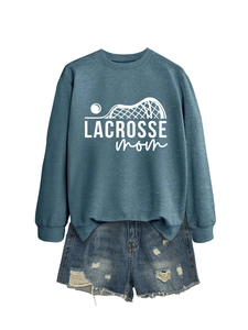 Close-up of Lacrosse Mom sweatshirt and denim shorts set with ribbed cuffs and white background