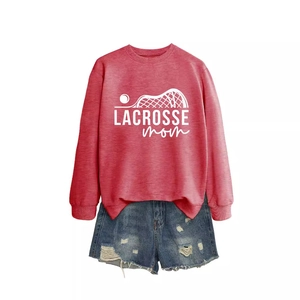 Women's Lacrosse Mom long sleeve red sweatshirt paired with denim shorts on white background