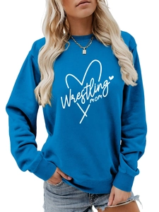 Detail of royal blue Wrestling Mom sweatshirt showing ribbed crewneck and heart print