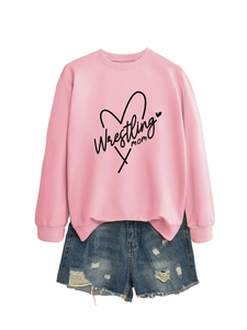 Pink crewneck sweatshirt featuring Wrestling Mom print and distressed denim shorts detail