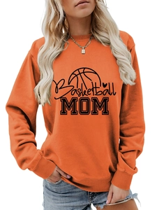 Detail view of rib-knit neckline on orange Basketball MOM crewneck sweatshirt