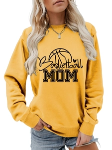 Detail of soft fleece cotton fabric and Basketball MOM print on yellow sweatshirt
