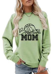 Close-up of Basketball MOM print on sage green crewneck sweatshirt with ribbed cuffs