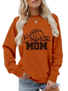 Detail of ribbed crew neck and black Basketball MOM print on orange cotton sweatshirt