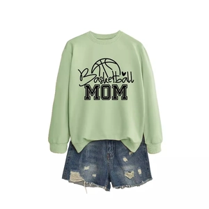 Light green Basketball MOM sweatshirt paired with distressed blue denim shorts