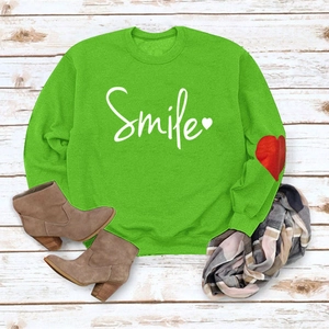 Casual bright green crewneck sweatshirt with Smile print and red heart sleeve patch