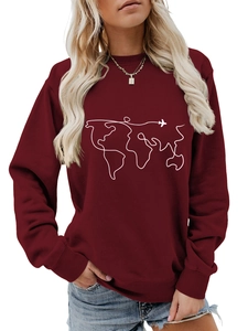 Detail showing world map and airplane graphic on a maroon long sleeve sweatshirt