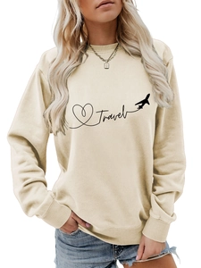 Detail of Travel letter print and airplane heart graphic on beige cotton sweatshirt