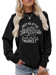 Gros plan de l'imprimé graphique Farmers Market sur sweat-shirt noir oversize