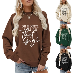 Detailed grid view of loose-fit crewneck sweatshirts in brown, cream, green and black colors