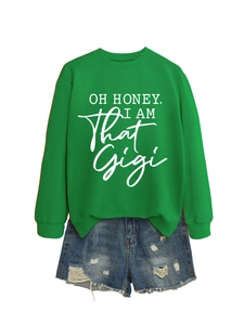Detail view of the Oh Honey I Am That Gigi green sweatshirt and ripped denim shorts set