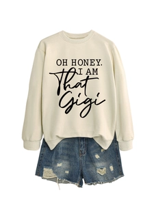Detail view of OH HONEY crewneck sweatshirt and distressed denim shorts outfit set