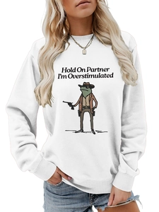 Detail of Cowboy Frog graphic and Hold On Partner text on white cotton sweatshirt