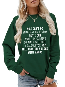 Close-up of white slogan print on dark green crewneck sweatshirt with ribbed cuffs