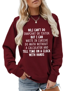 Detail of the white humorous lettering printed on this burgundy crewneck sweatshirt