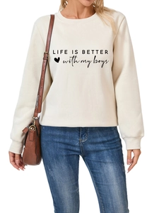 Detail of beige fleece sweatshirt featuring Life is Better with My Boys graphic print