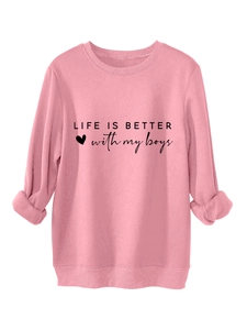 Detail of pink crewneck sweatshirt featuring Life Is Better With My Boys printed slogan