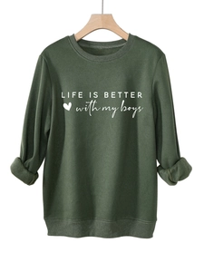 Detail showing the thick fleece lining on the cuff of this green crewneck sweatshirt