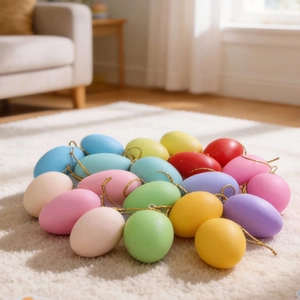 Colorful Easter egg ornaments with hanging strings in assorted pastel matte finishes