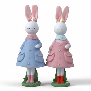 Ornamenti pasquali in resina a forma di coniglio rosa e blu con trama in tessuto