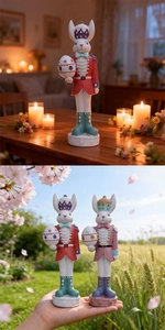 Nutcracker Easter bunny figurines with crowns and eggs on wooden table and outdoors